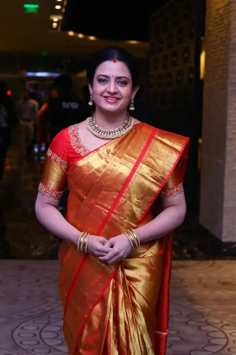 ACTRESS INDRAJA IN ORANGE SAREE AT RAZAKAR MOVIE EVENT 14